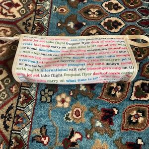 Kate Spade White with Colorful Airplane Trip Sayings Small Makeup Bag